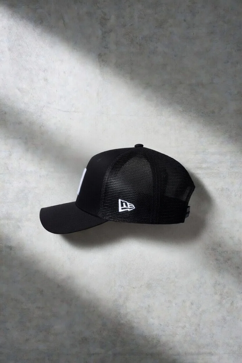 Side view of the SUL New Era cap showing the side flag and mesh panels